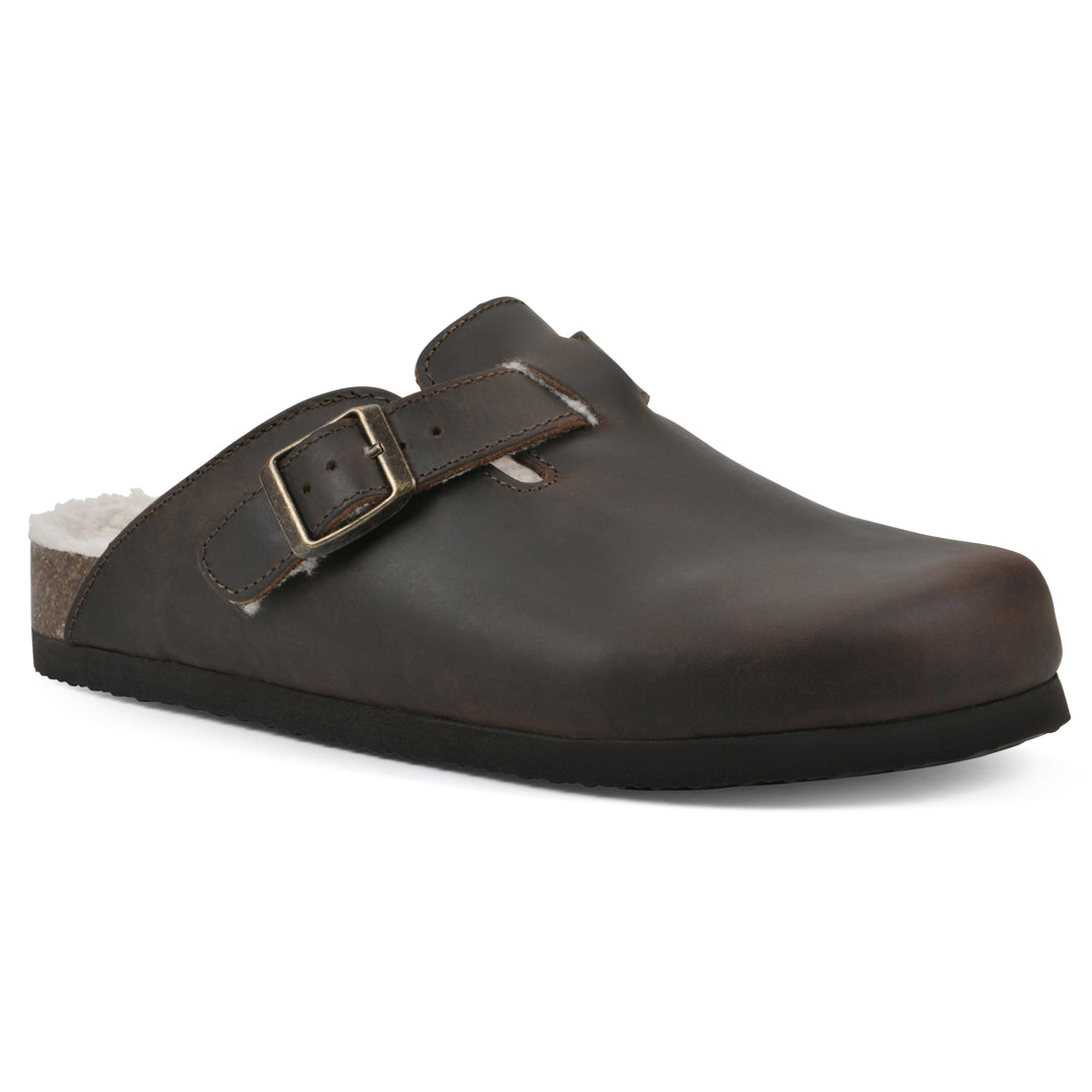 Angle view of a brown leather clog with white faux shearling lining, a metal buckle on an adjustable strap, and a brown sole with black bottom