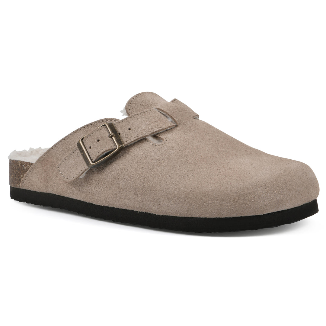 Angle view of a taupe suede clog with white faux shearling lining, a metal buckle on an adjustable strap, and a brown sole with black bottom