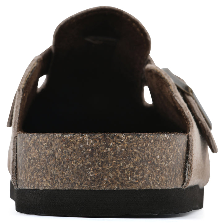 Rear view of a taupe suede clog with metal buckle on an adjustable strap, and a brown sole with black bottom