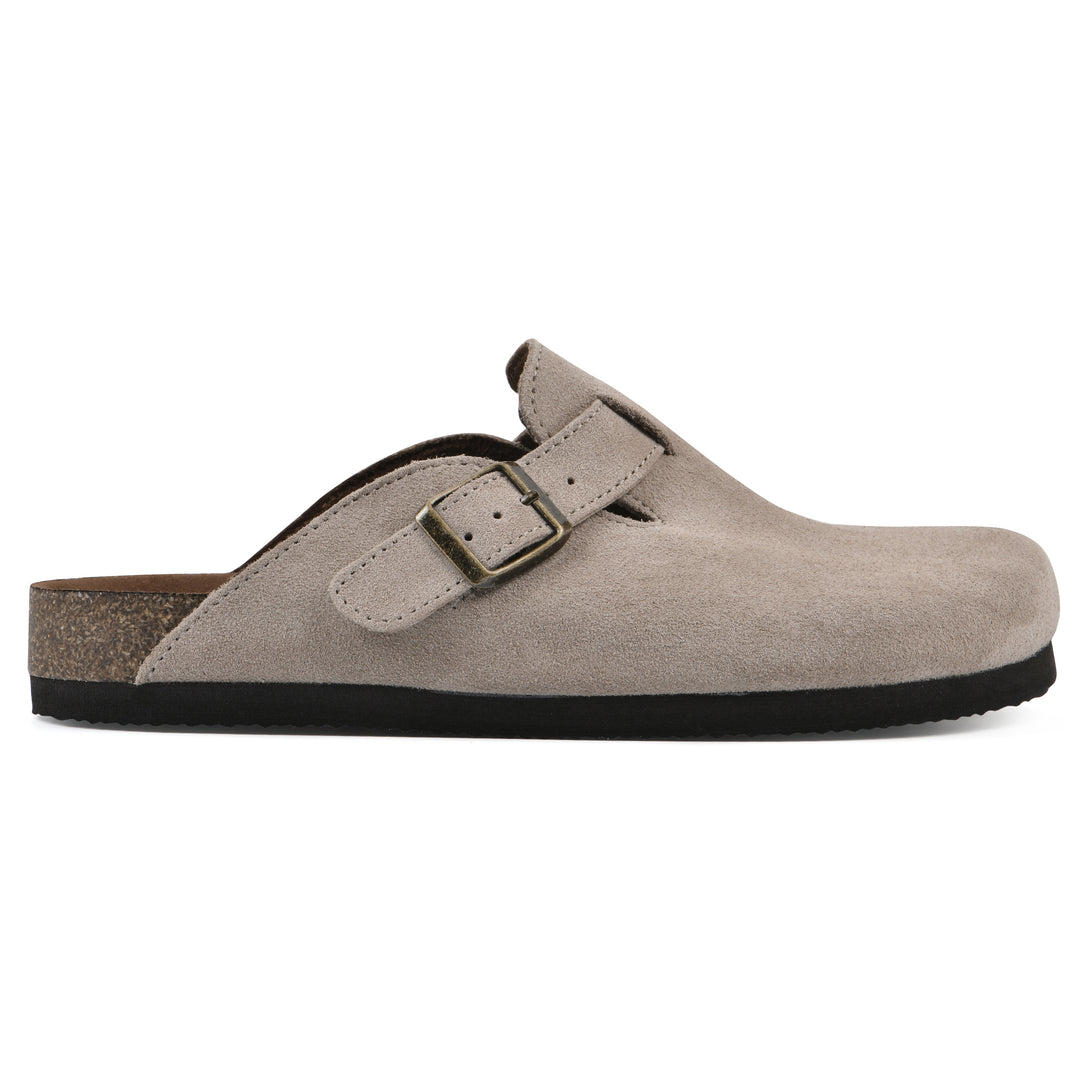 Side view of a taupe suede clog with metal buckle on an adjustable strap, and a brown sole with black bottom