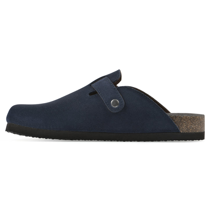 Side view of a navy suede clog with metal buckle on an adjustable strap, and a brown sole with black bottom