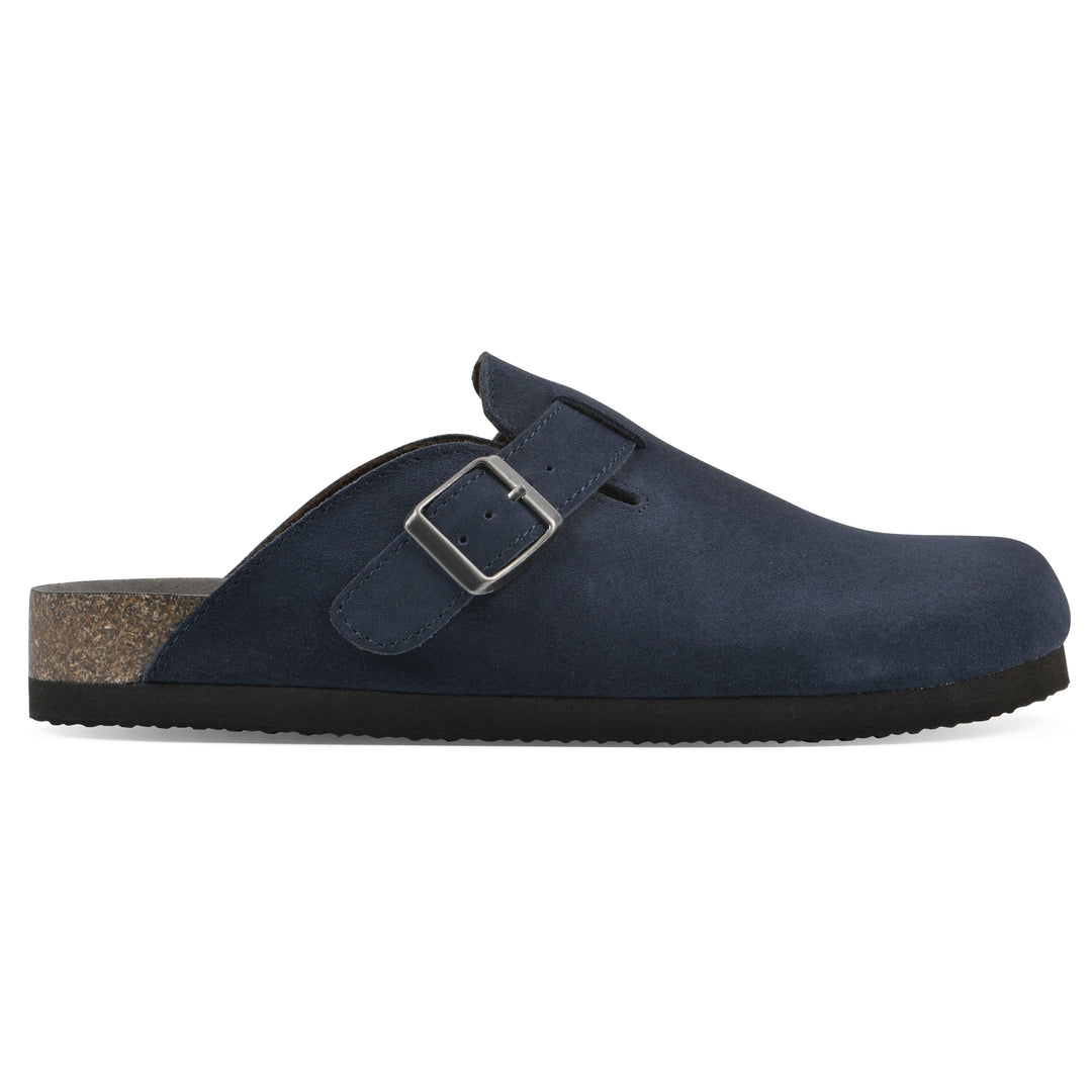 Side view of a navy suede clog with metal buckle on an adjustable strap, and a brown sole with black bottom