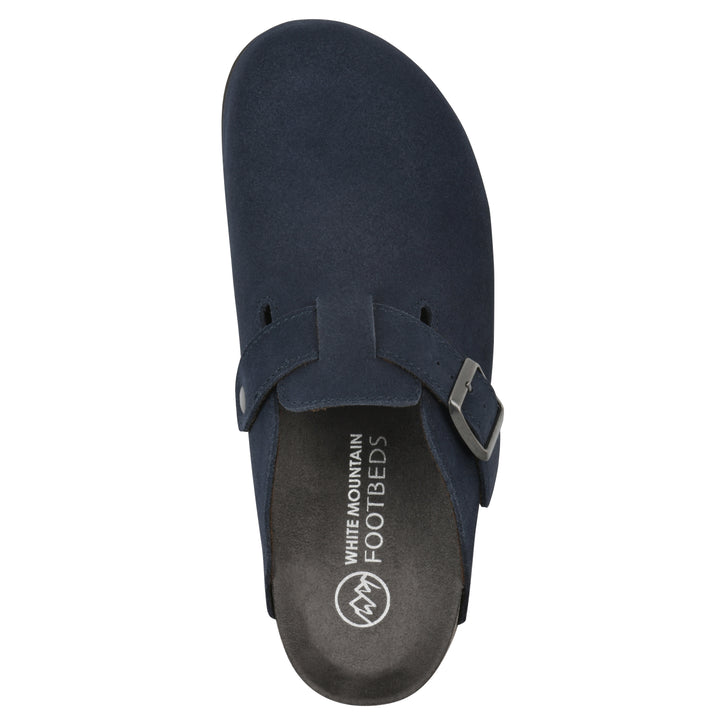 Top view of a navy suede clog with metal buckle on an adjustable strap, and a brown sole with black bottom