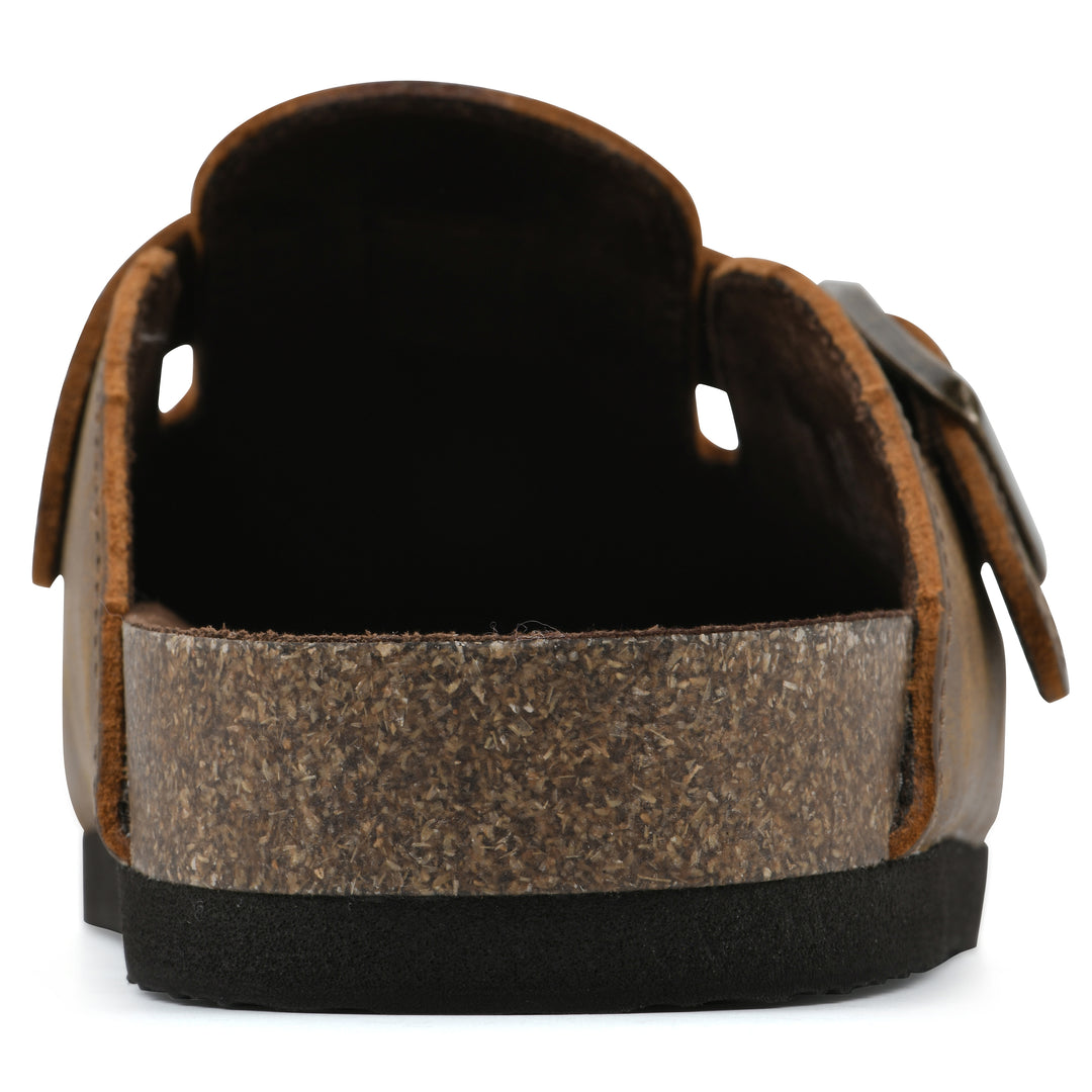 Rear view of a whiskey leather clog with metal buckle on an adjustable strap, and a brown sole with black bottom