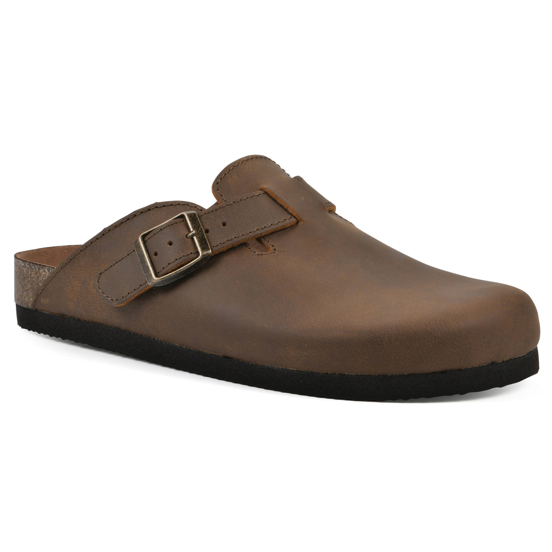 Angle view of a whiskey leather clog with metal buckle on an adjustable strap, and a brown sole with black bottom