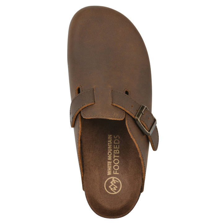 Top view of a whiskey leather clog with metal buckle on an adjustable strap, and a brown sole with black bottom