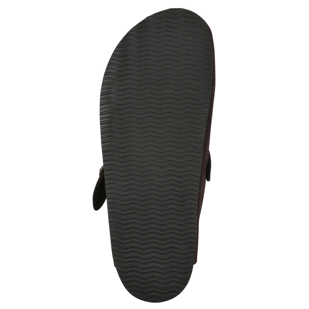 Sole view of a brown suede clog with a metal buckle on an adjustable strap, and a brown sole with black patterned bottom