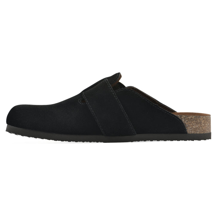 Side view of a black suede backless clog with large adjustable buckle and a black sole