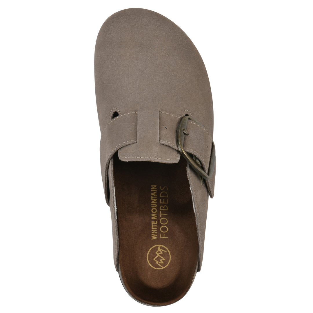 Top view of a taupe suede backless clog with large adjustable buckle and a black sole