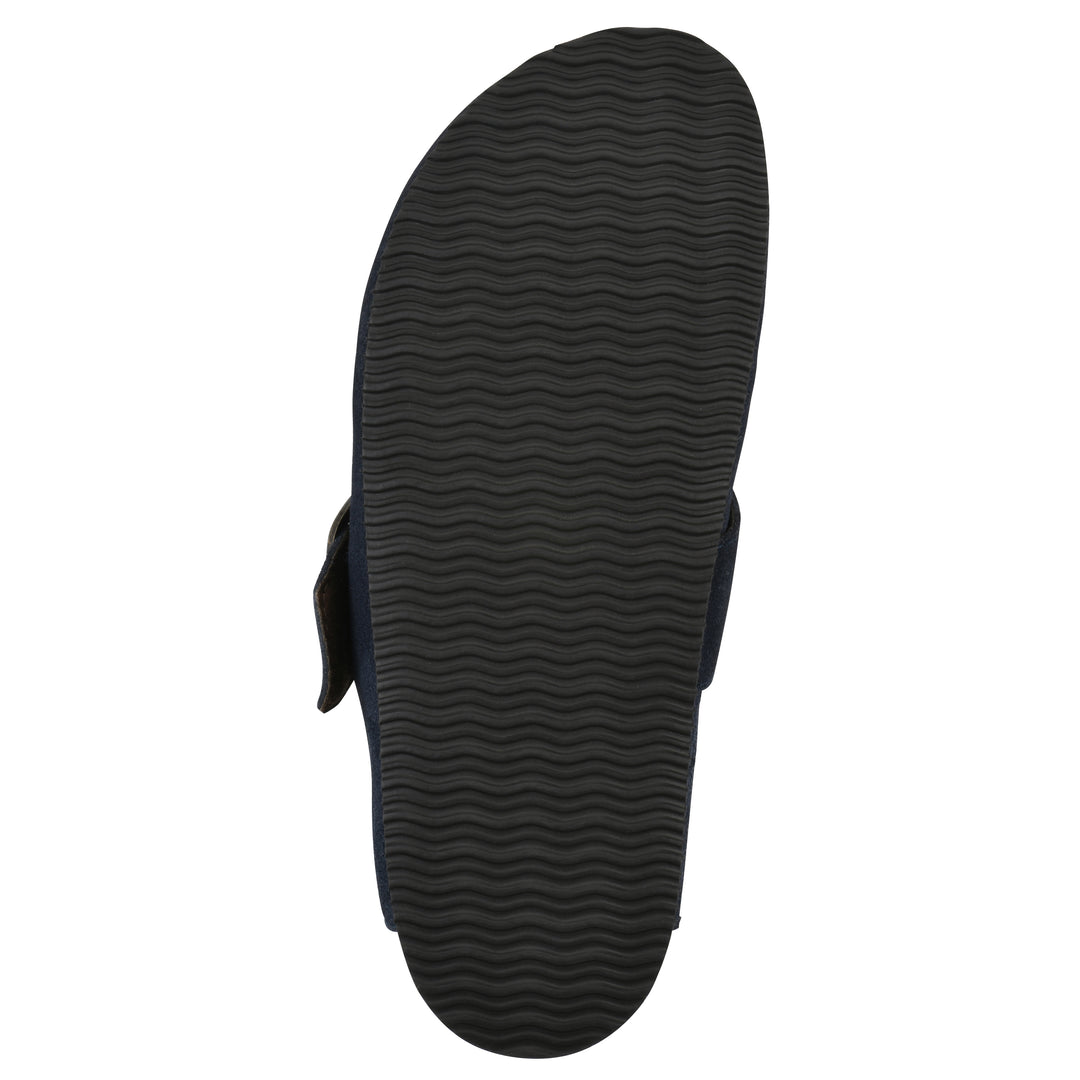 Sole view of a navy suede backless clog with large adjustable buckle and a black sole