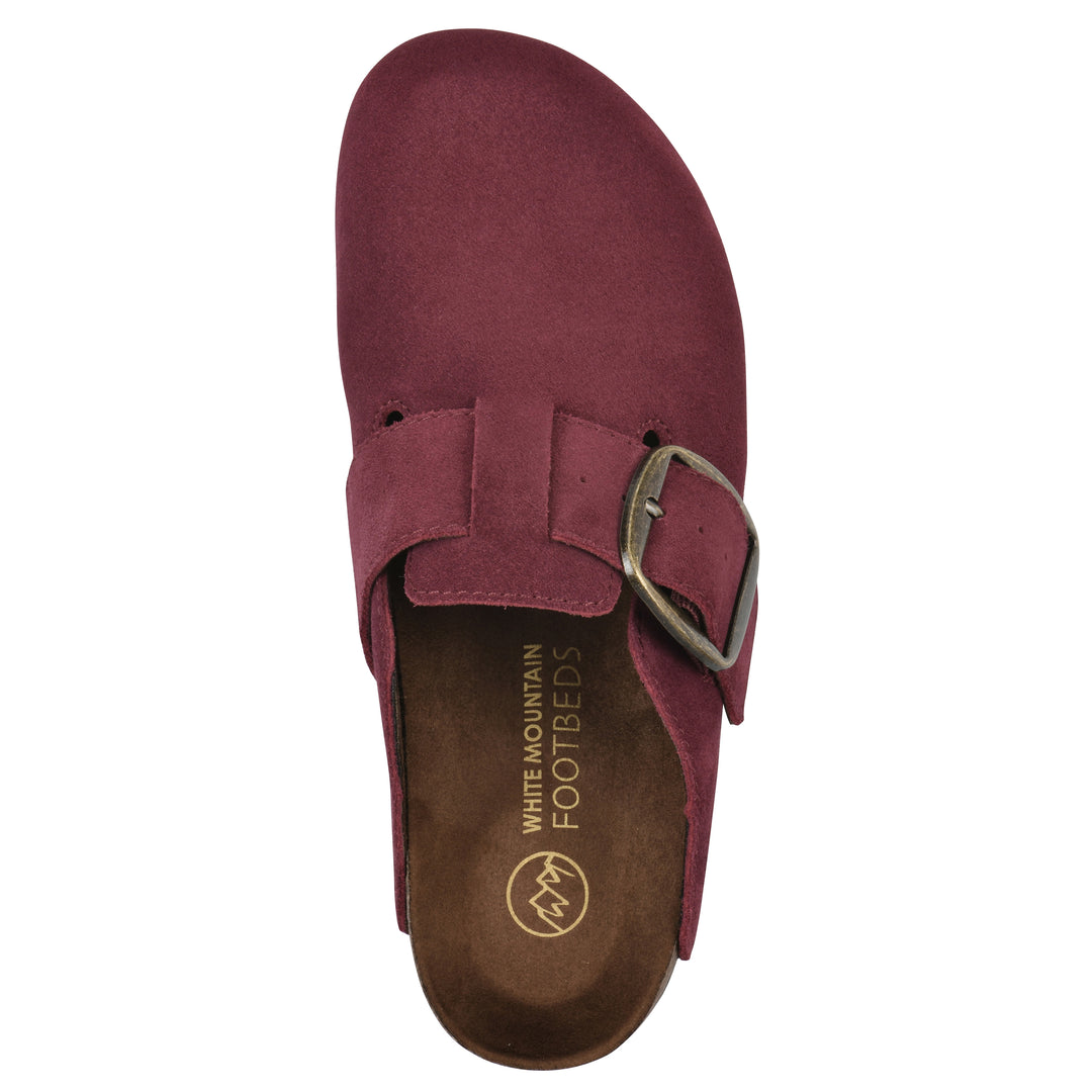 Top view of a burgundy suede backless clog with large adjustable buckle and a black sole