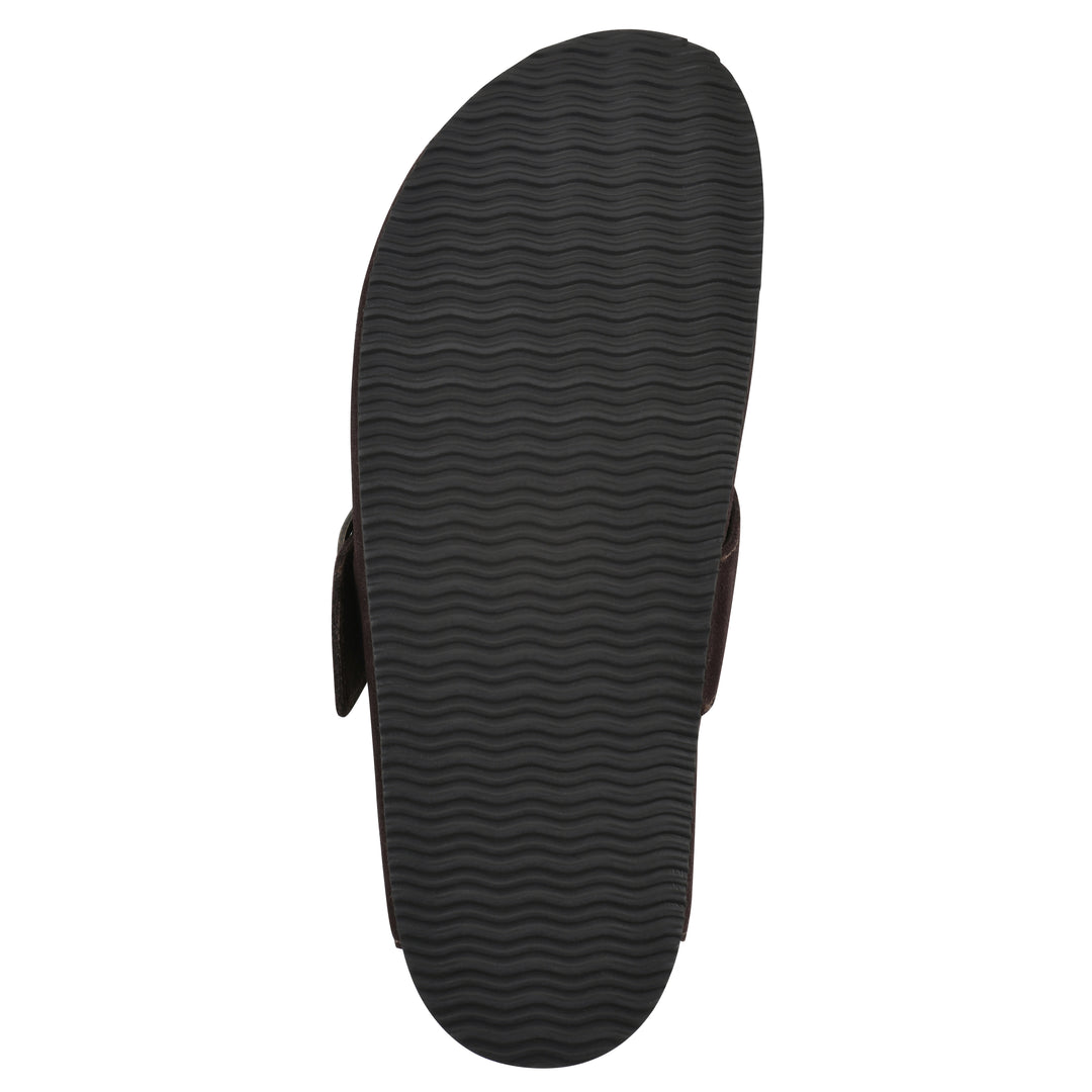 Sole view of a brown suede backless clog with large adjustable buckle and a black sole
