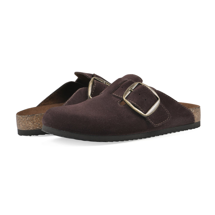 Angle view of a pair of brown suede backless clogs with large adjustable buckle and a black sole
