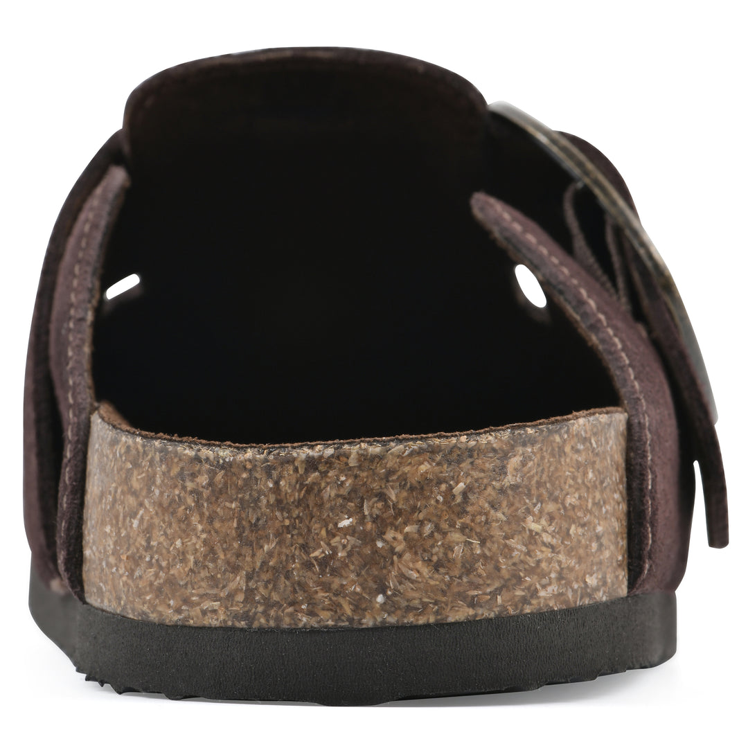Rear view of a brown suede backless clog with large adjustable buckle and a black sole