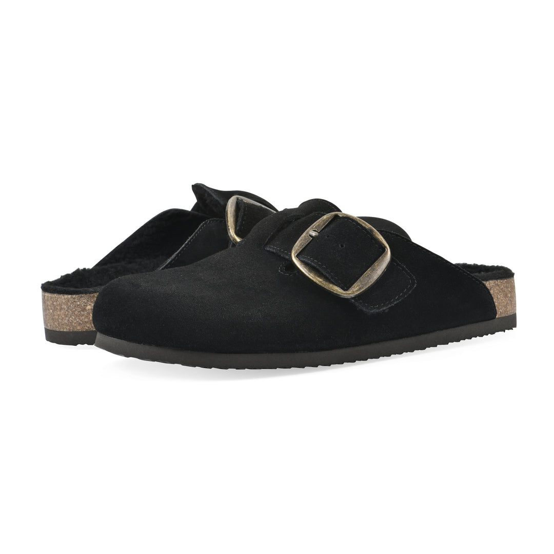 Angle view of a pair of black suede backless clogs with large adjustable buckle and a black sole