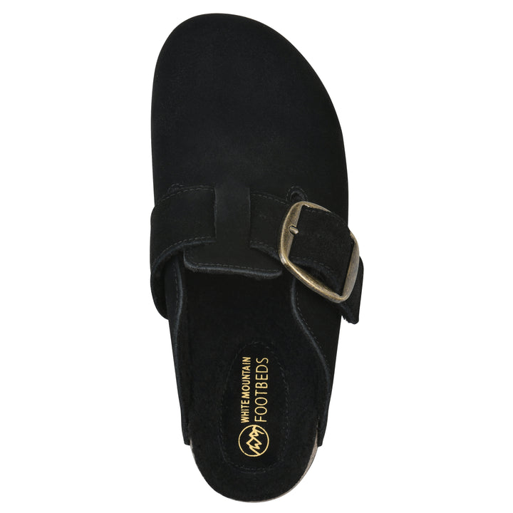 Top view of a black suede backless clog with large adjustable buckle and a black sole