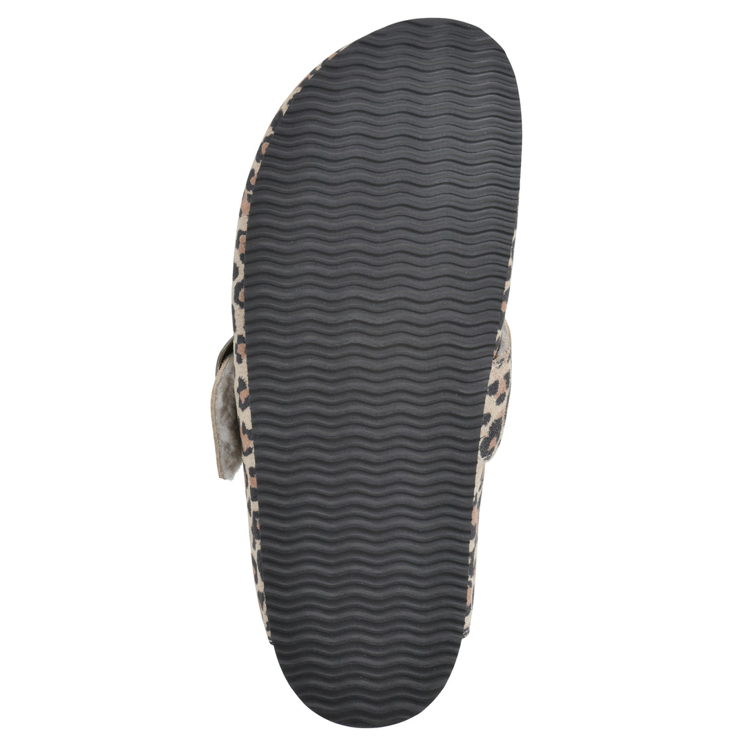 Sole view of a leopard print suede backless clog with cream, faux fur lining, a large adjustable buckle, and a black sole