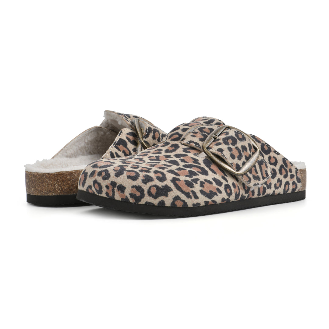 Angle view of a pair of leopard print suede backless clogs with cream, faux fur lining, a large adjustable buckle, and a black sole