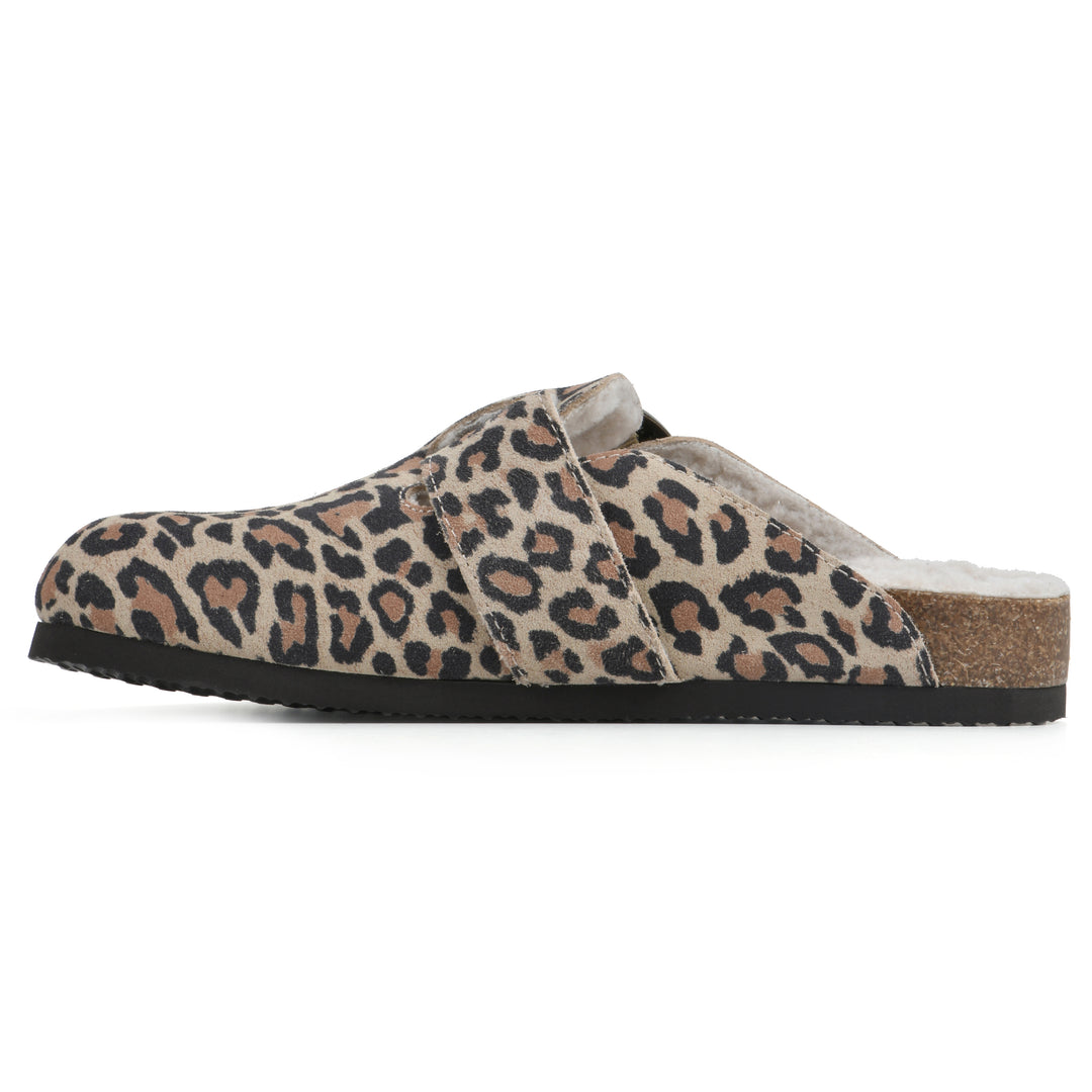 Side view of a leopard print suede backless clog with cream, faux fur lining, a large adjustable buckle, and a black sole