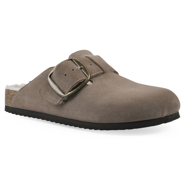 Angle view of a taupe suede backless clog with cream, faux fur lining, a large adjustable buckle, and a black sole