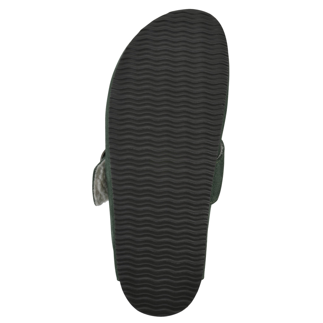 Sole view of a hunter green suede backless clog with cream, faux fur lining, a large adjustable buckle, and a black sole