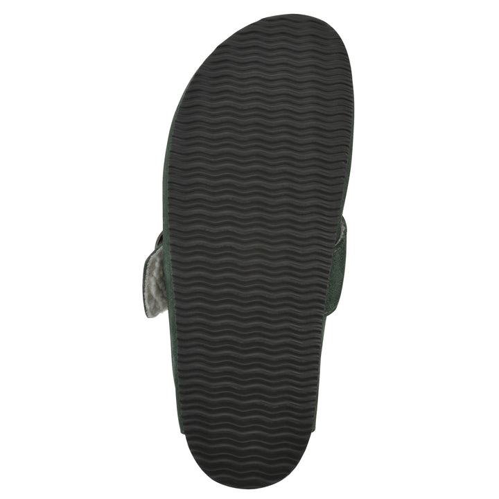 Sole view of a hunter green suede backless clog with cream, faux fur lining, a large adjustable buckle, and a black sole