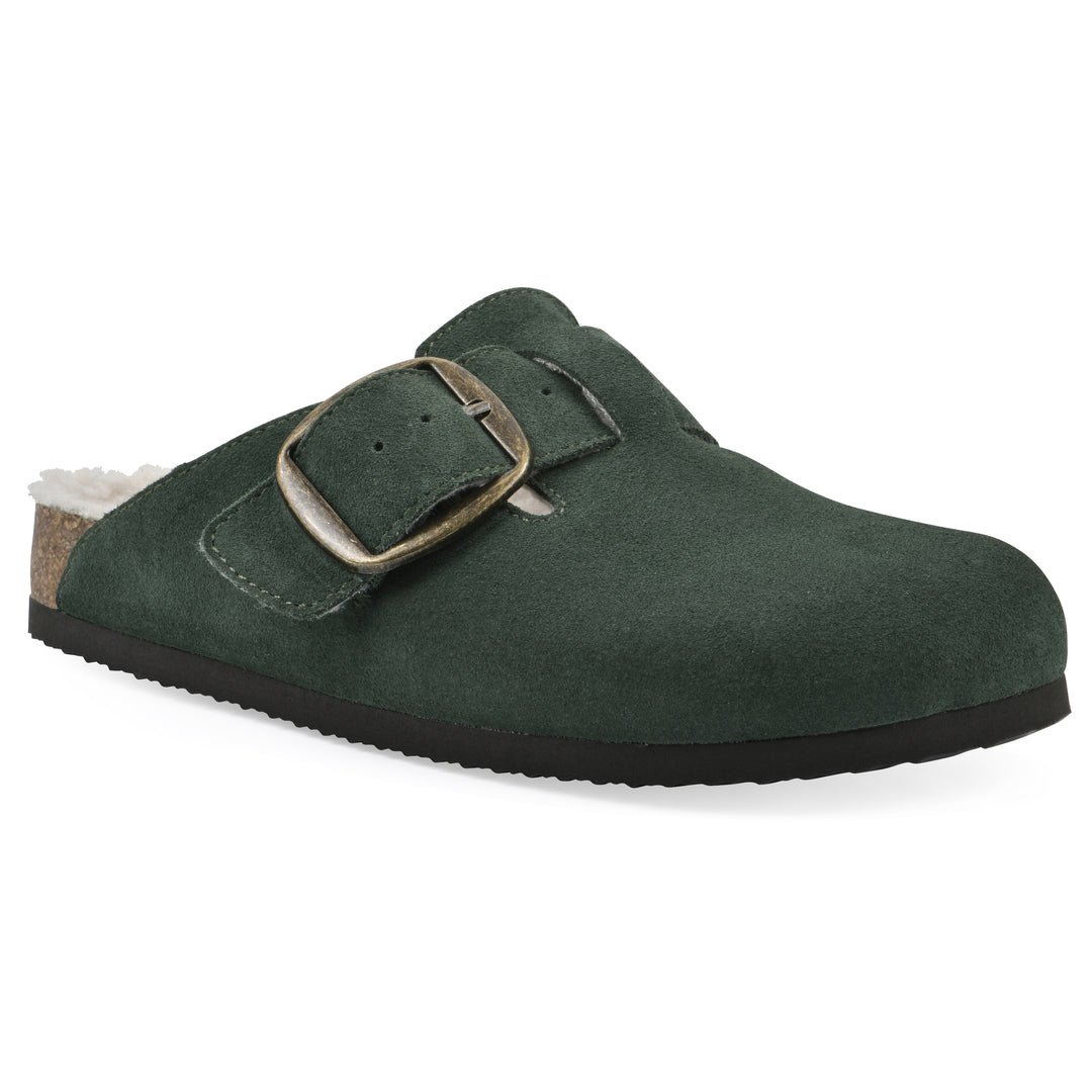 Angle view of a hunter green suede backless clog with cream, faux fur lining, a large adjustable buckle, and a black sole