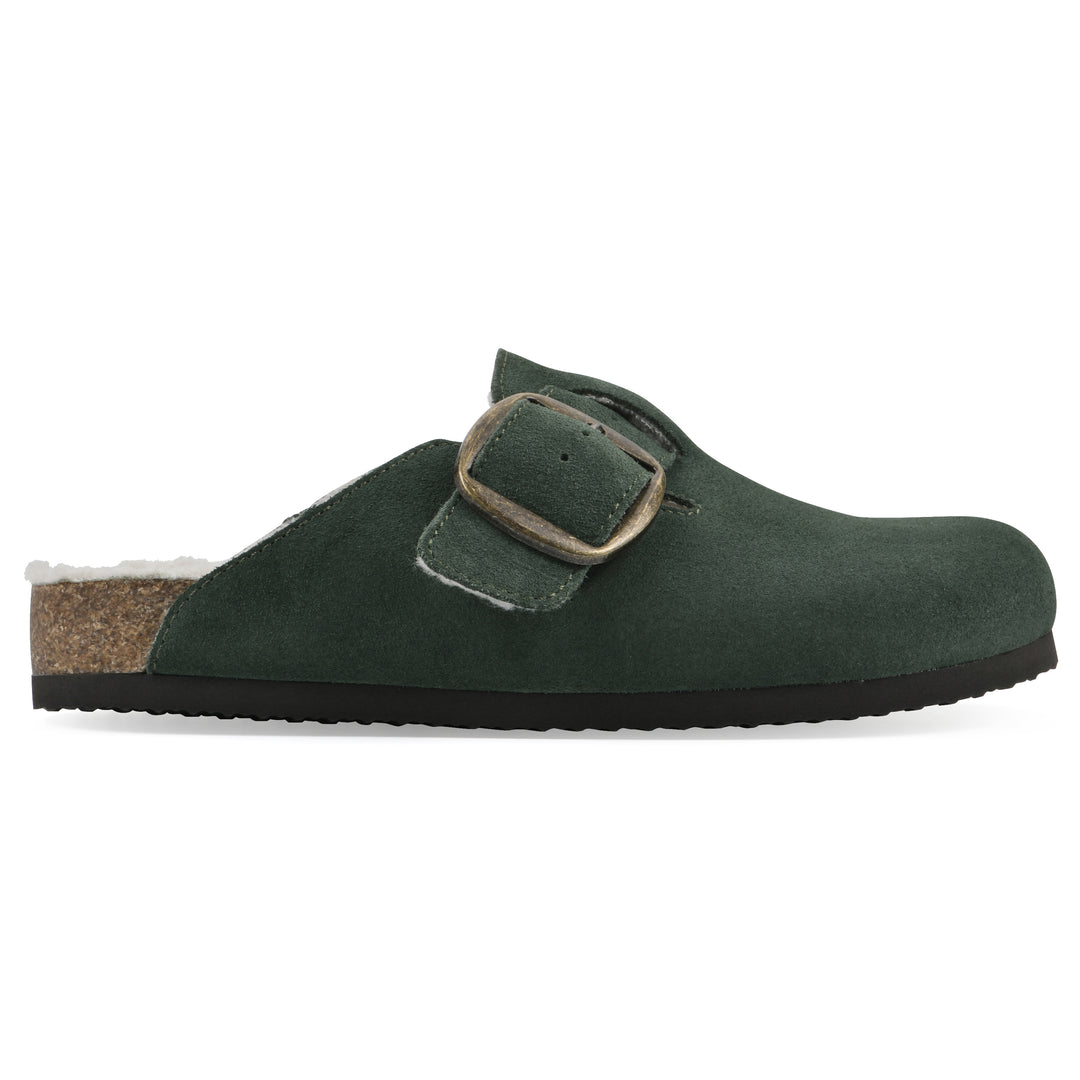 Side view of a hunter green suede backless clog with cream, faux fur lining, a large adjustable buckle, and a black sole