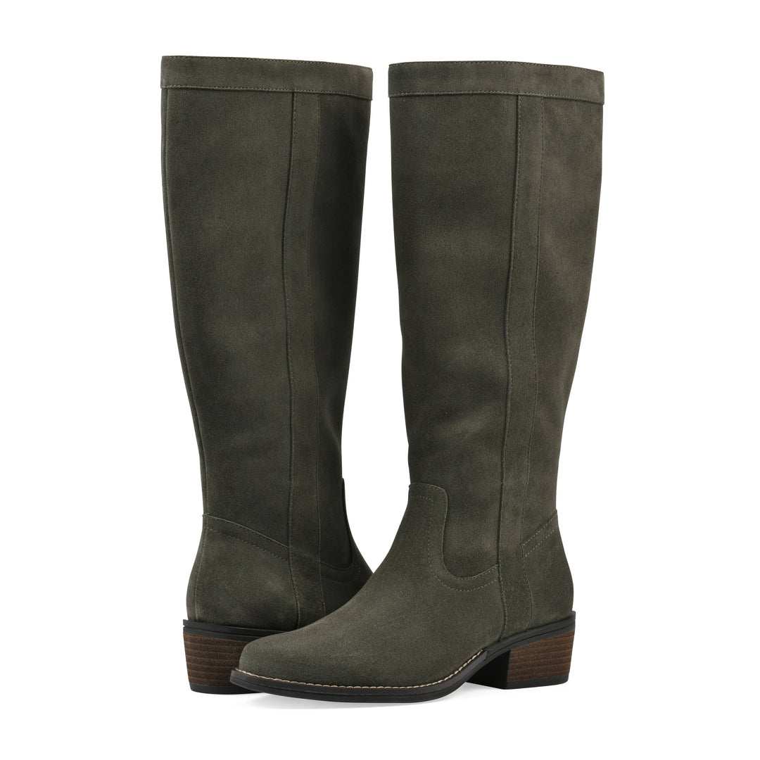 Angle view of a pair of olive-green suede tall boots with a low stacked, dark brown heel, and tapered toe