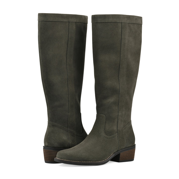 Angle view of a pair of olive-green suede tall boots with a low stacked, dark brown heel, and tapered toe