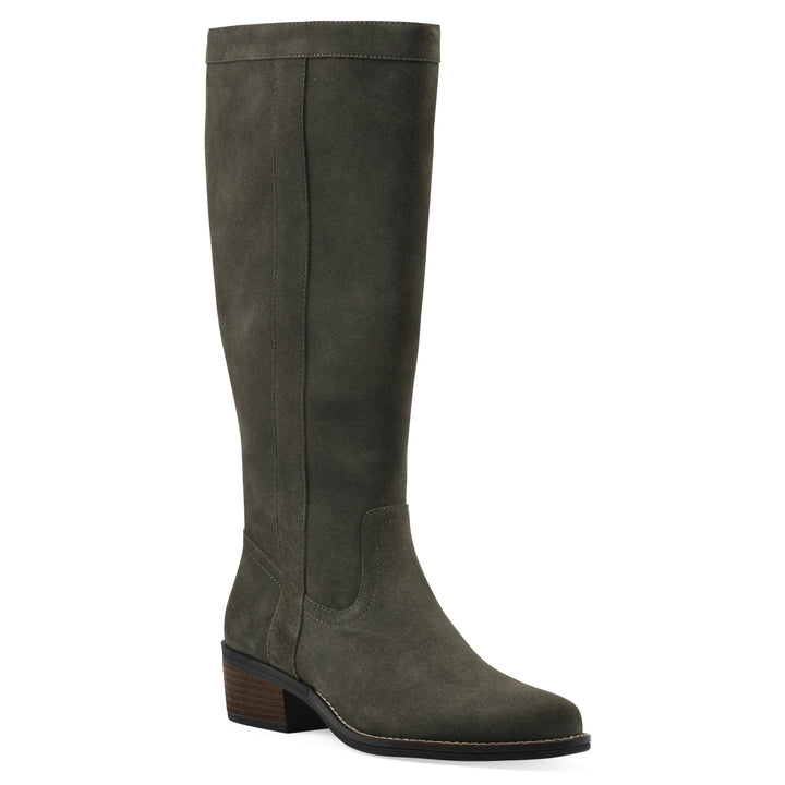 Angle view of an olive-green suede tall boot with a low stacked, dark brown heel, and tapered toe