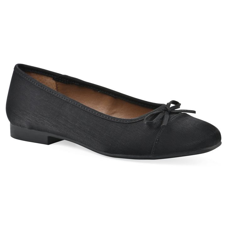 Angle view of a black shimmer fabric flat with small, centered black bow and a black sole