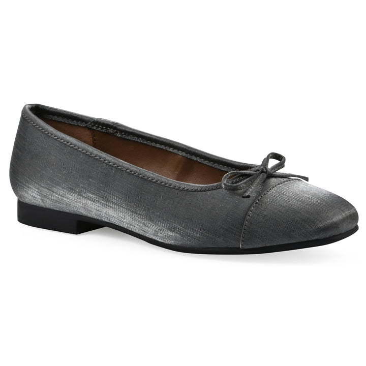 Angle view of a gunmetal shimmer fabric flat with small, centered black bow and a black sole