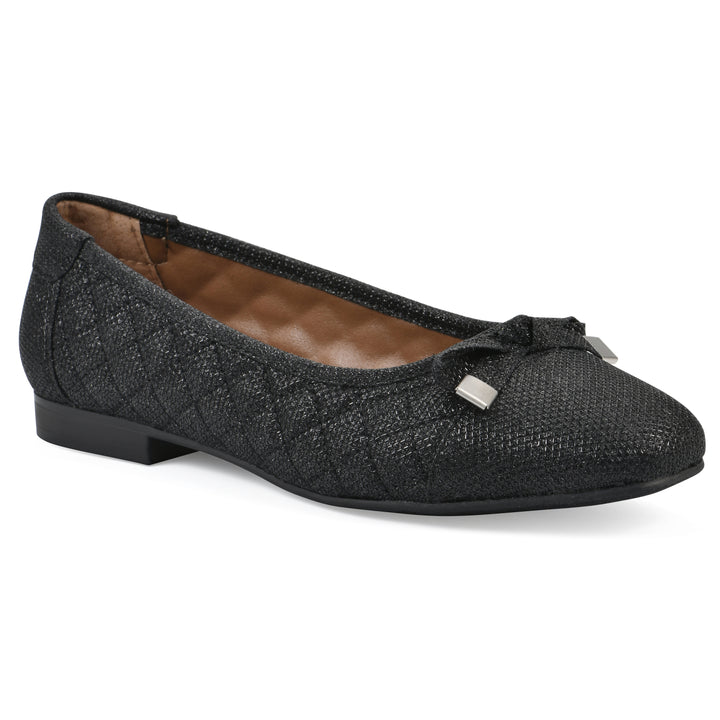 Angle view of a black glitter quilted pattern flat with small, centered bow and a black sole