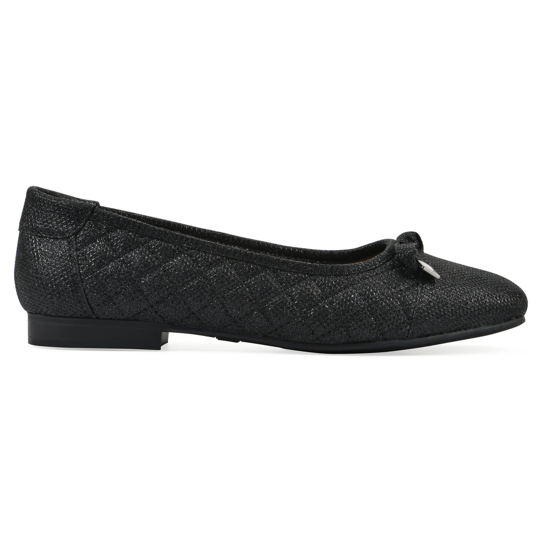 Side view of a black glitter quilted pattern flat with small, centered bow and a black sole
