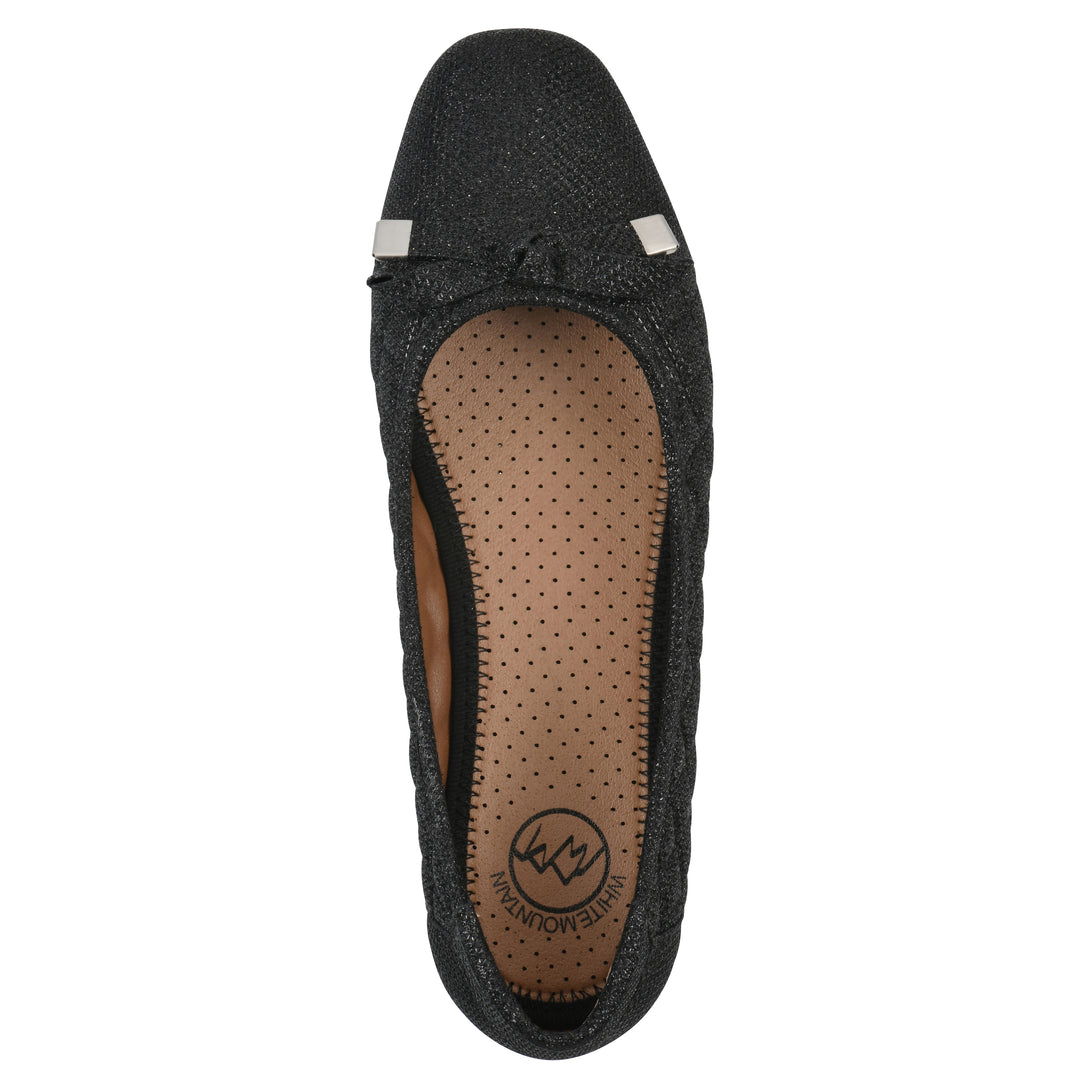 Top view of a black glitter quilted pattern flat with small, centered bow and a black sole