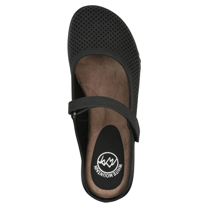 Top view of a black colored clog with a closed toe and adjustable strap, featuring a perforated diamond design and a low heel.