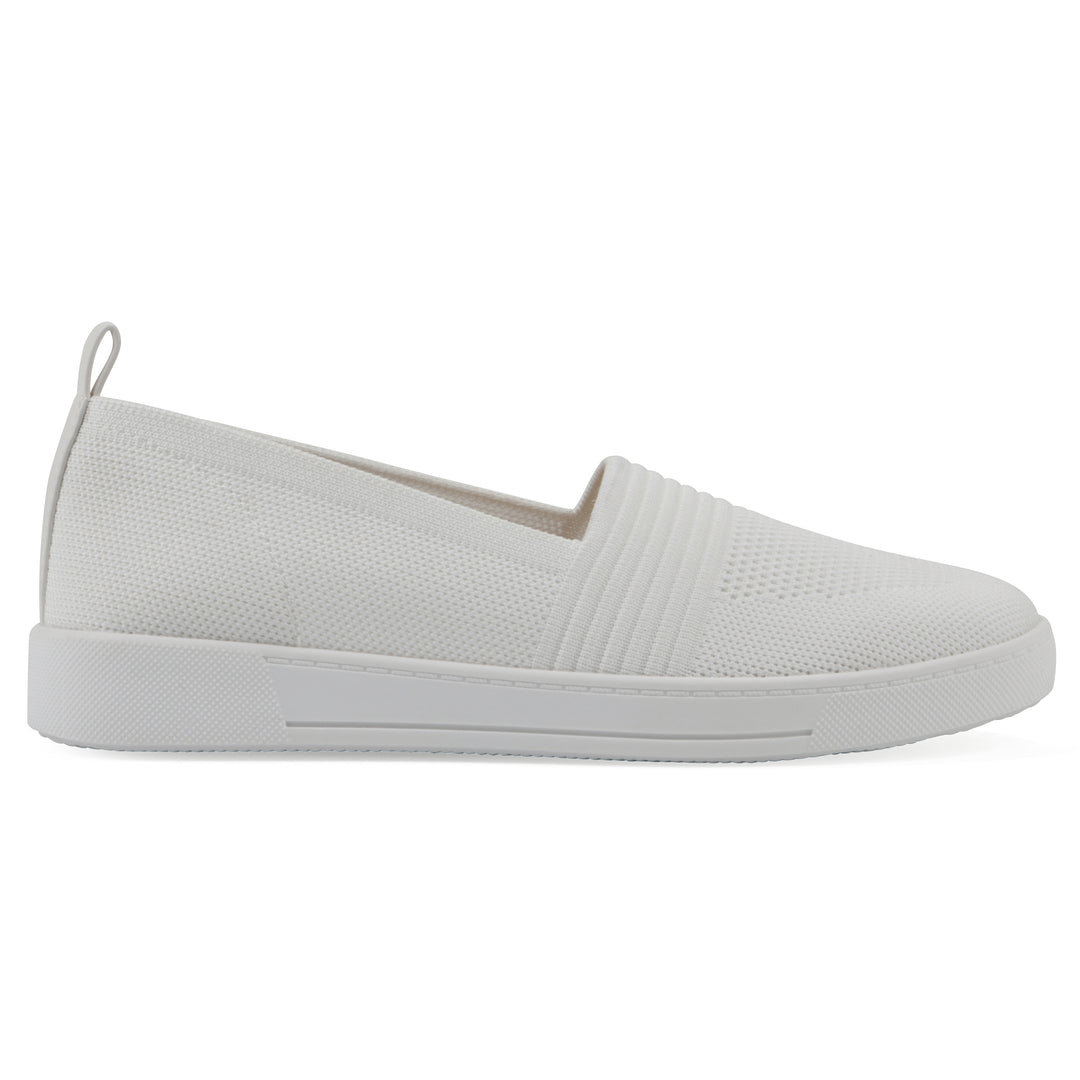 Side view of a white slip-on sneaker with white sole, and perforated mesh fabric