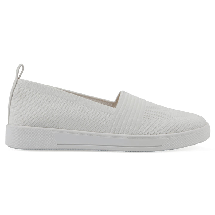 Side view of a white slip-on sneaker with white sole, and perforated mesh fabric