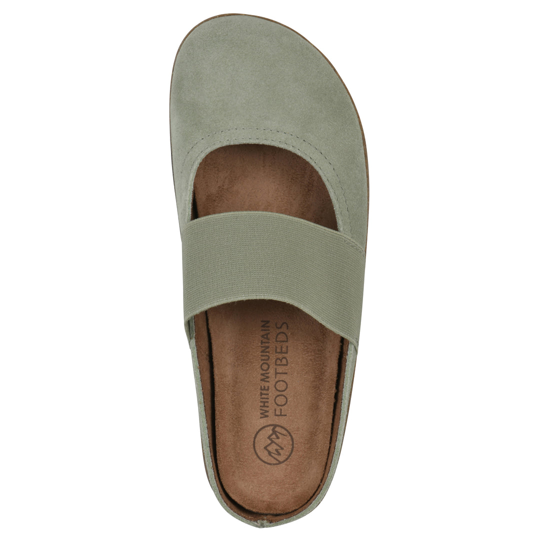 Top view of a sage suede backless clog with Mary Jane style center strap and a brown sole with black bottom