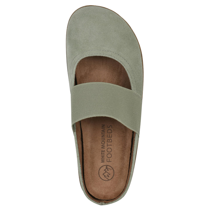 Top view of a sage suede backless clog with Mary Jane style center strap and a brown sole with black bottom