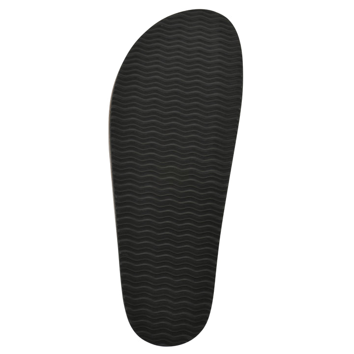 Sole view of a denim backless clog with Mary Jane style center strap and a brown sole with black bottom