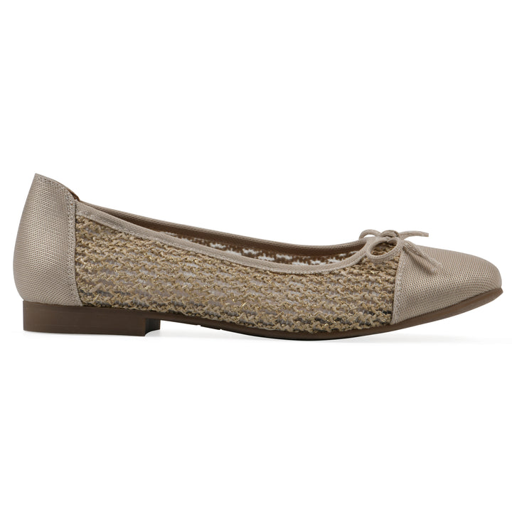 Side view of a natural metallic raffia flat with small, centered bow and a brown sole