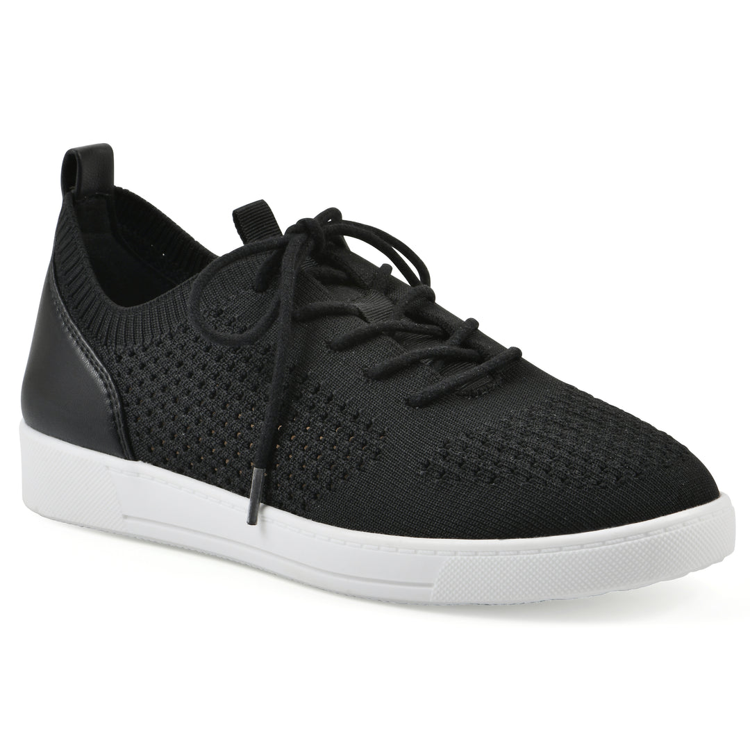 Angle view of a black sneaker with white sole, lace-up design and perforated mesh fabric