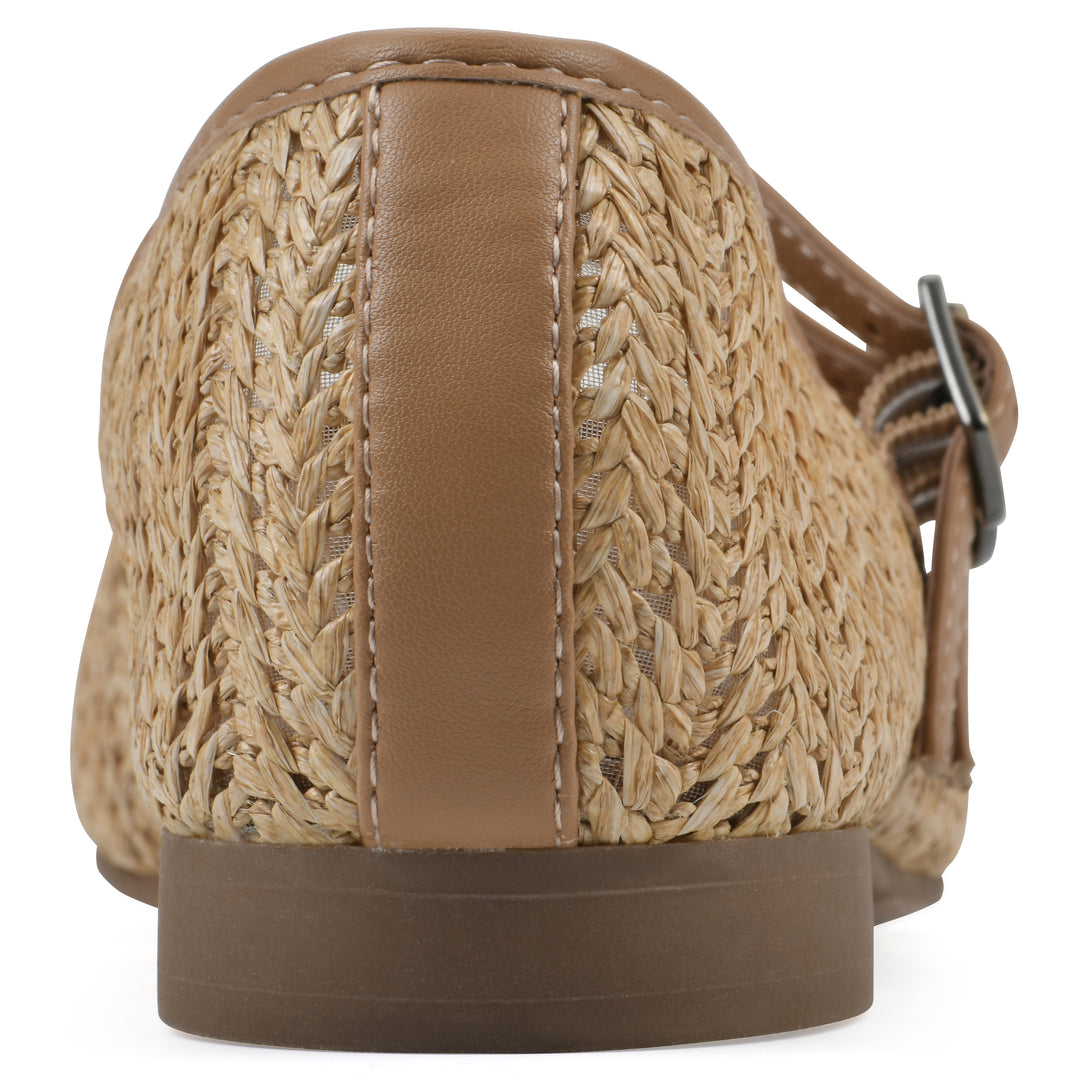 Rear view of a natural raffia ballet flat with double adjustable mini straps and a brown sole