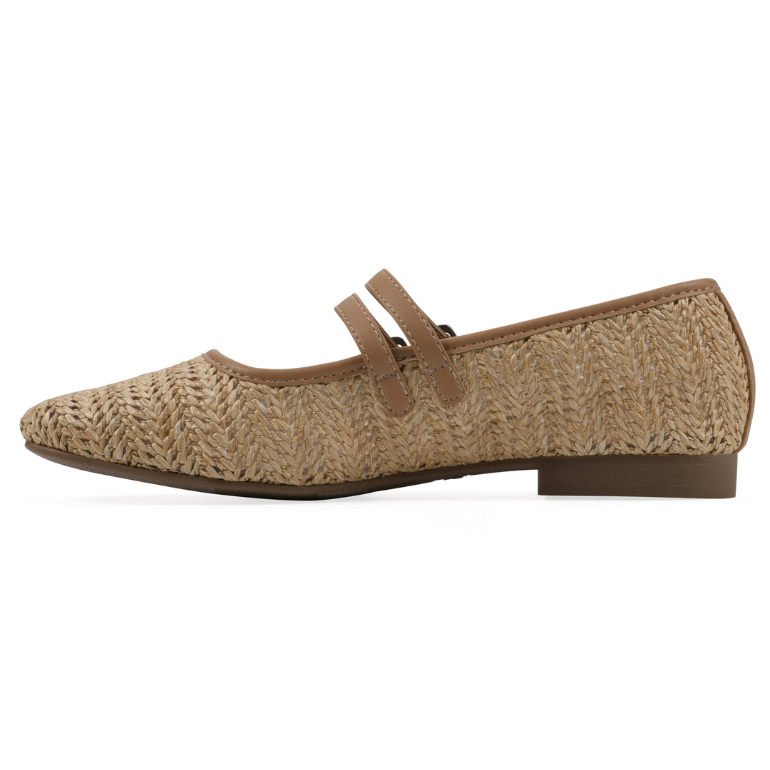 Side view of a natural raffia ballet flat with double adjustable mini straps and a brown sole