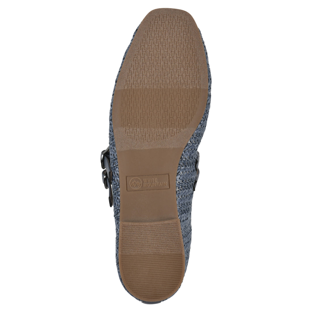 Sole view of a blue raffia ballet flat with double adjustable mini straps and a brown sole
