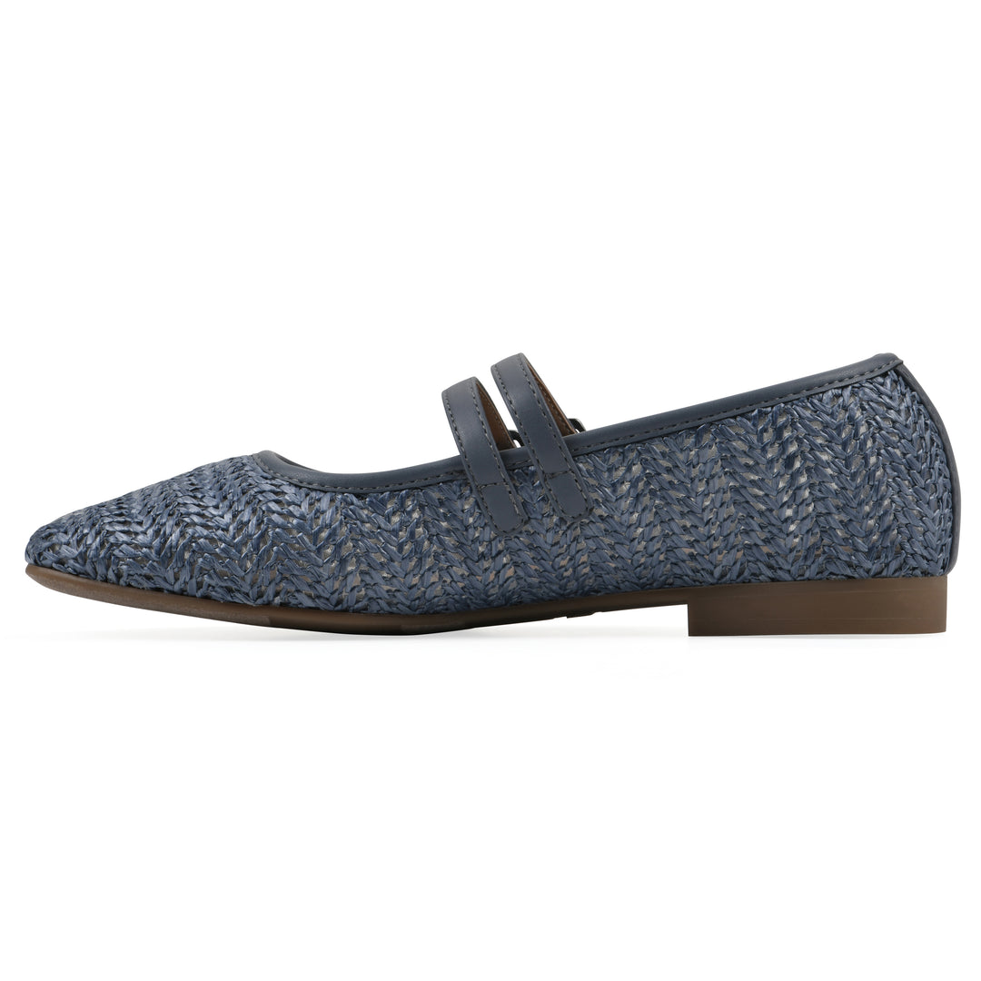 Side view of a blue raffia ballet flat with double adjustable mini straps and a brown sole