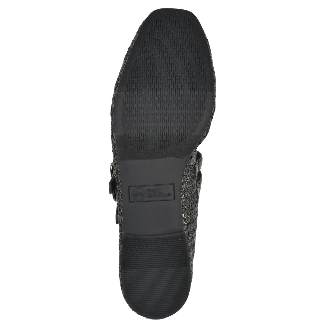 Sole view of a black raffia ballet flat with double adjustable mini straps and a black sole