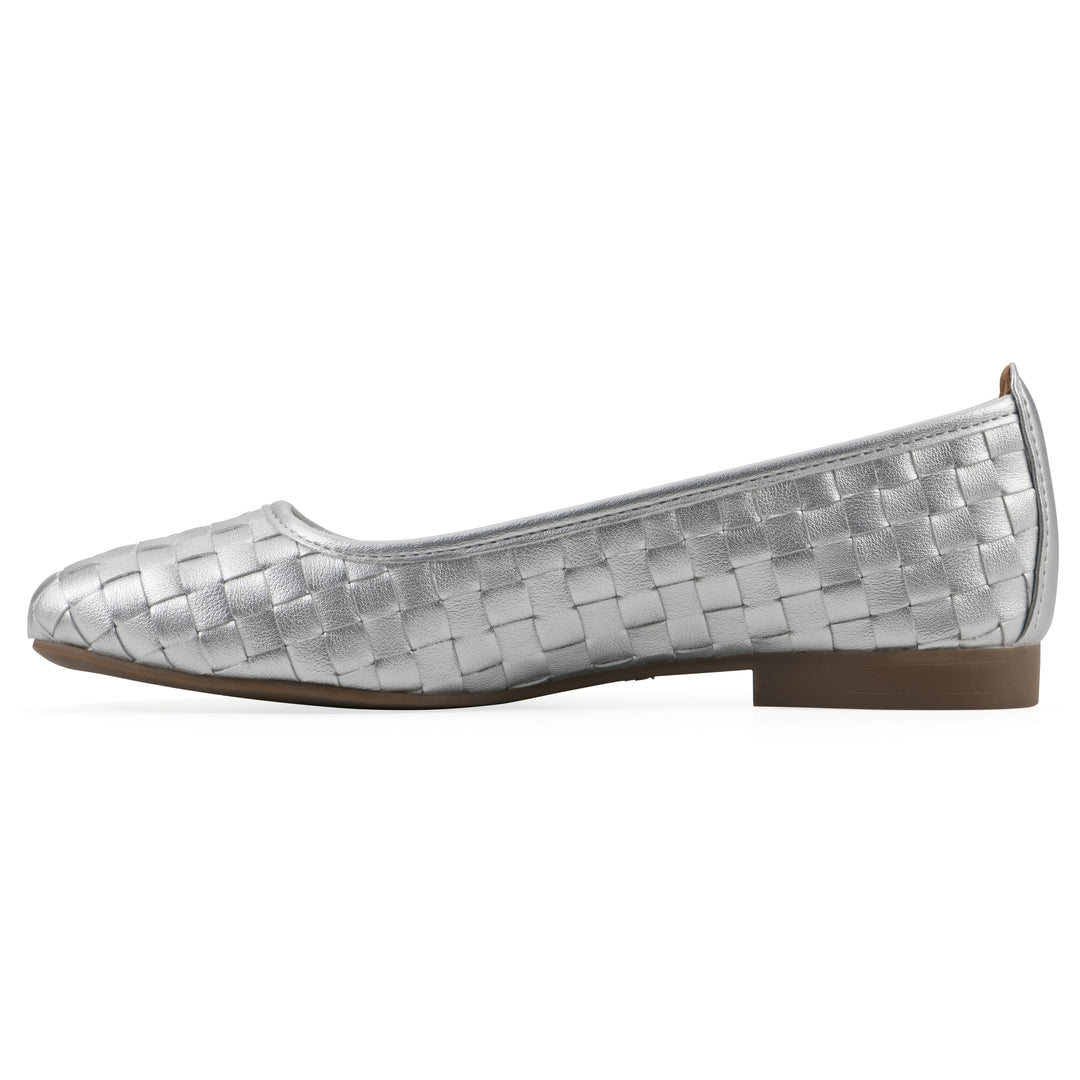 Side view of a quilted style silver flat with low brown sole